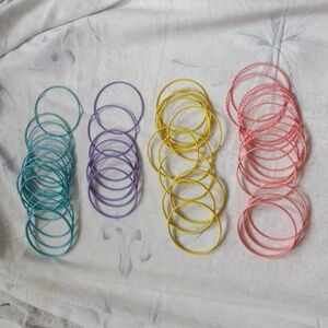 Set of 49 pink blue yellow purple bangles